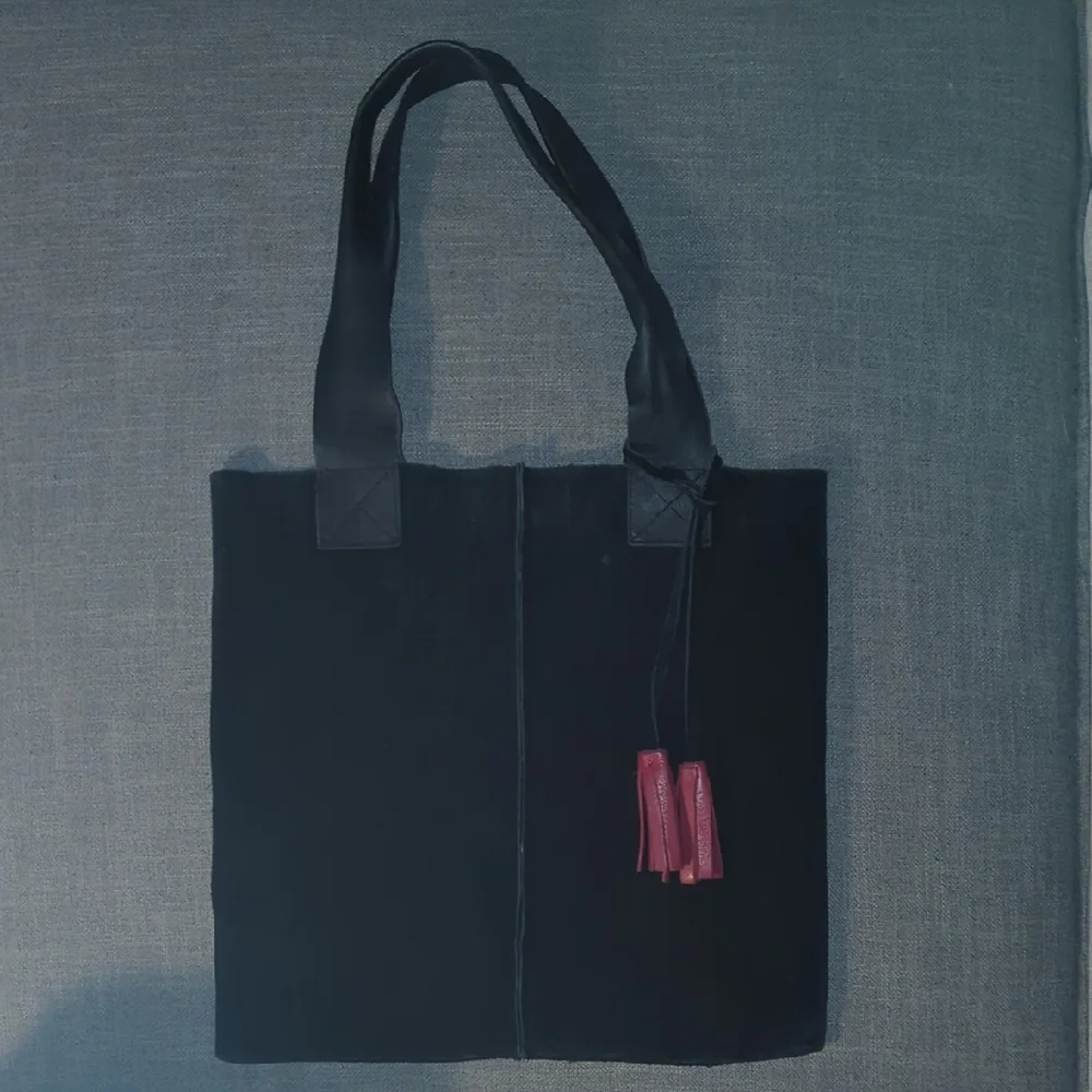 Black Suede Tote Bag with Red Leather Tassel Accents - Picture 2 of 6